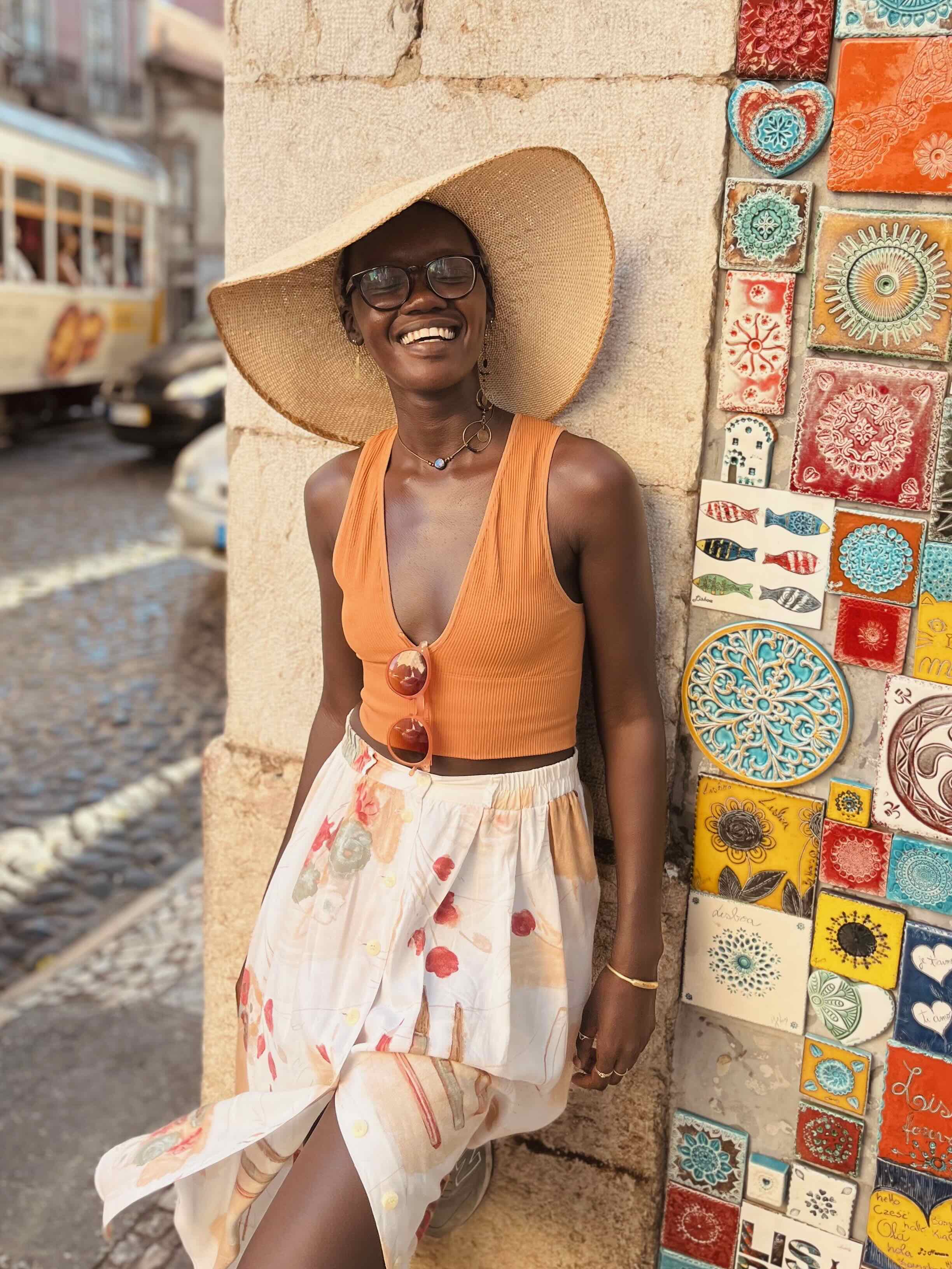 Profile Picture: Standing next to a colourful wall in sunny Lisbon